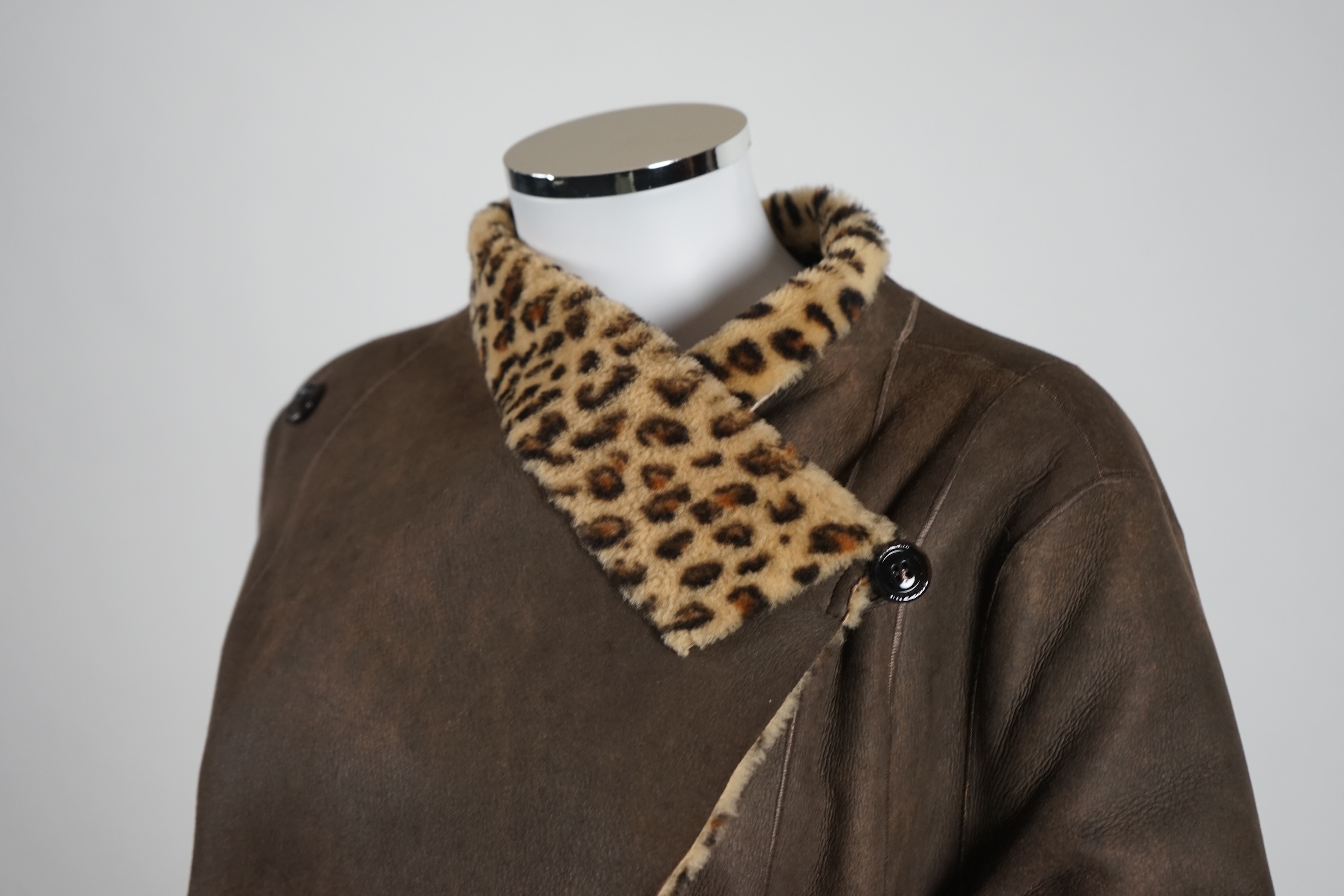 A Marc Caine lady's faux suede coat and three tops. Approx sizes 14-16 Proceeds to Happy Paws Puppy Rescue